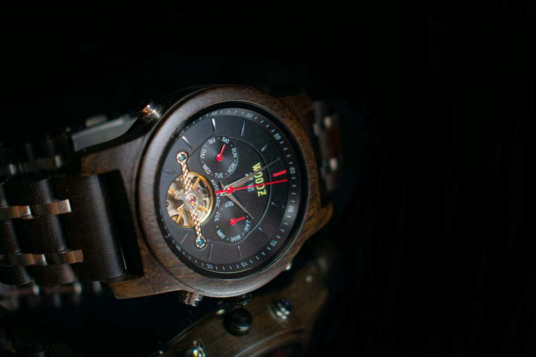 a close up of a watch on a table