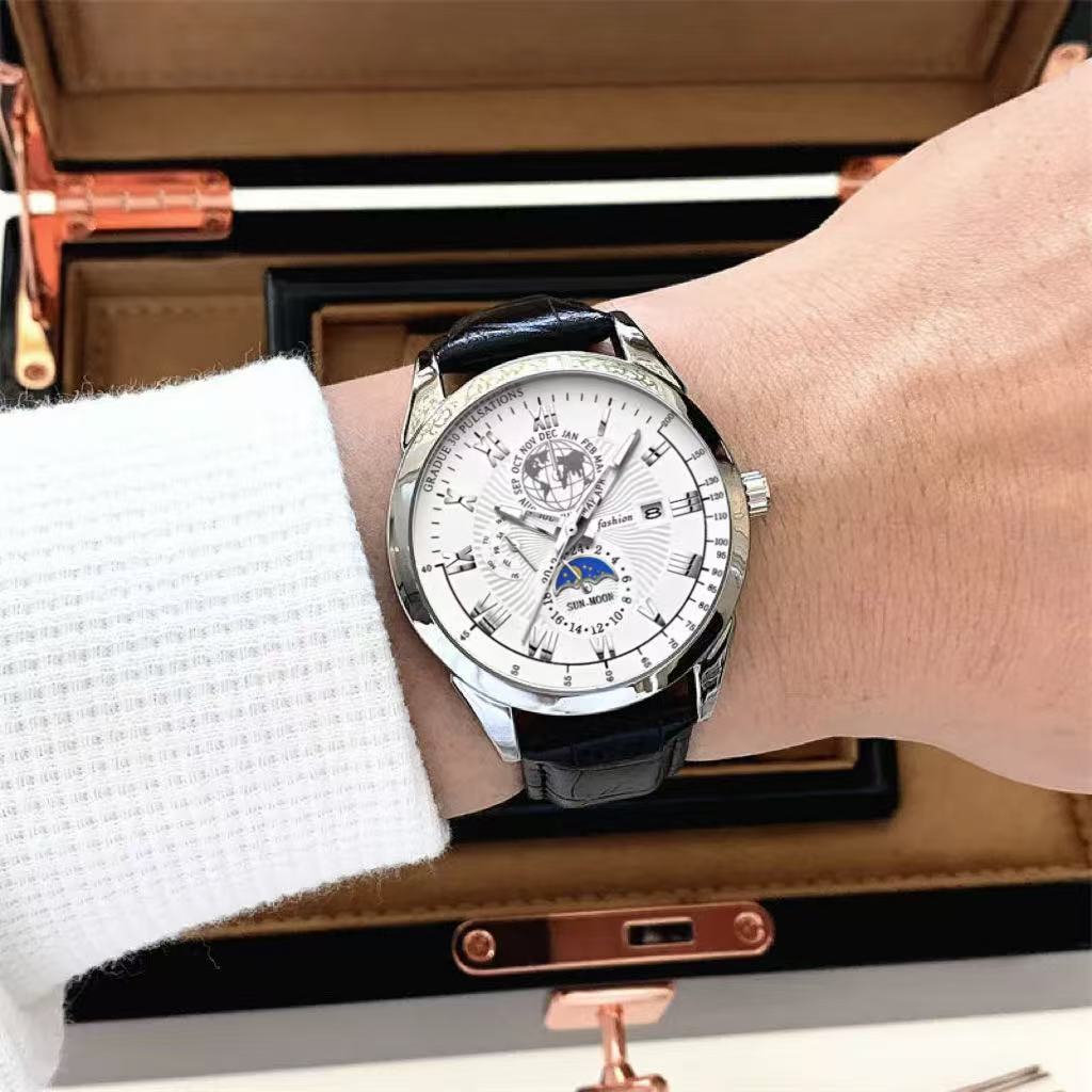 Luxury wristwatch with detailed face on a wrist, displayed against a brown box background.