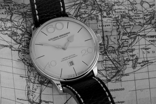 silver and white analog watch