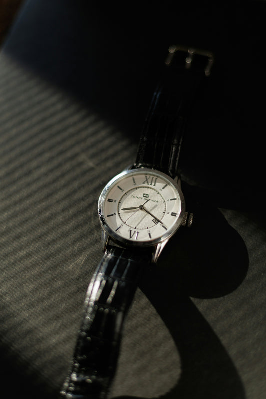 Classic wristwatch with roman numerals on strap