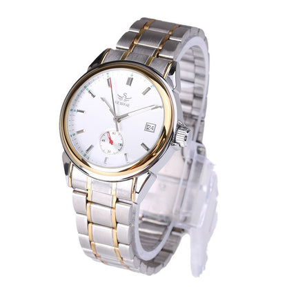Wristwatch with a silver and gold metal band on a white background